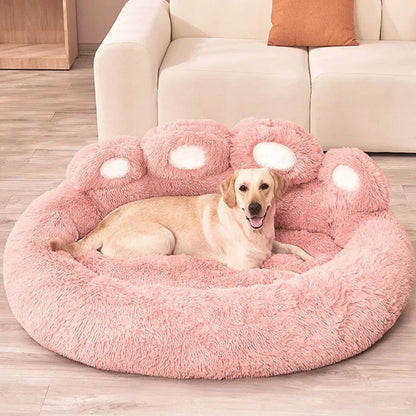 Lit apaisant en forme de patte pour chien rose 